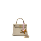 Hermes kelly 25 togo beton GHW with an extra hermes rodeo pm bag charm
