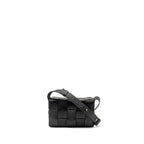 BOTTEGA VENETA SMALL CASSETTE BAG LAMBSKIN BLACK GHW
