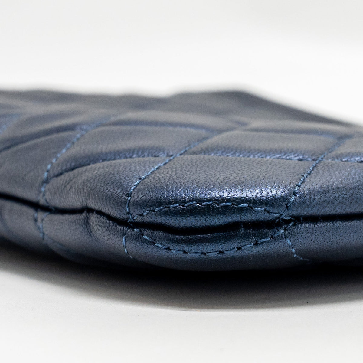 CHANEL BOY CLUTCH CALFSKIN PEARLY BLUE GHW
