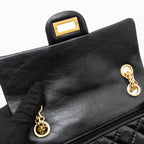 CHANEL MINI 2.55 REISSUE FLAP BAG AGED CALFSKIN BLACK GHW (MICROCHIP)