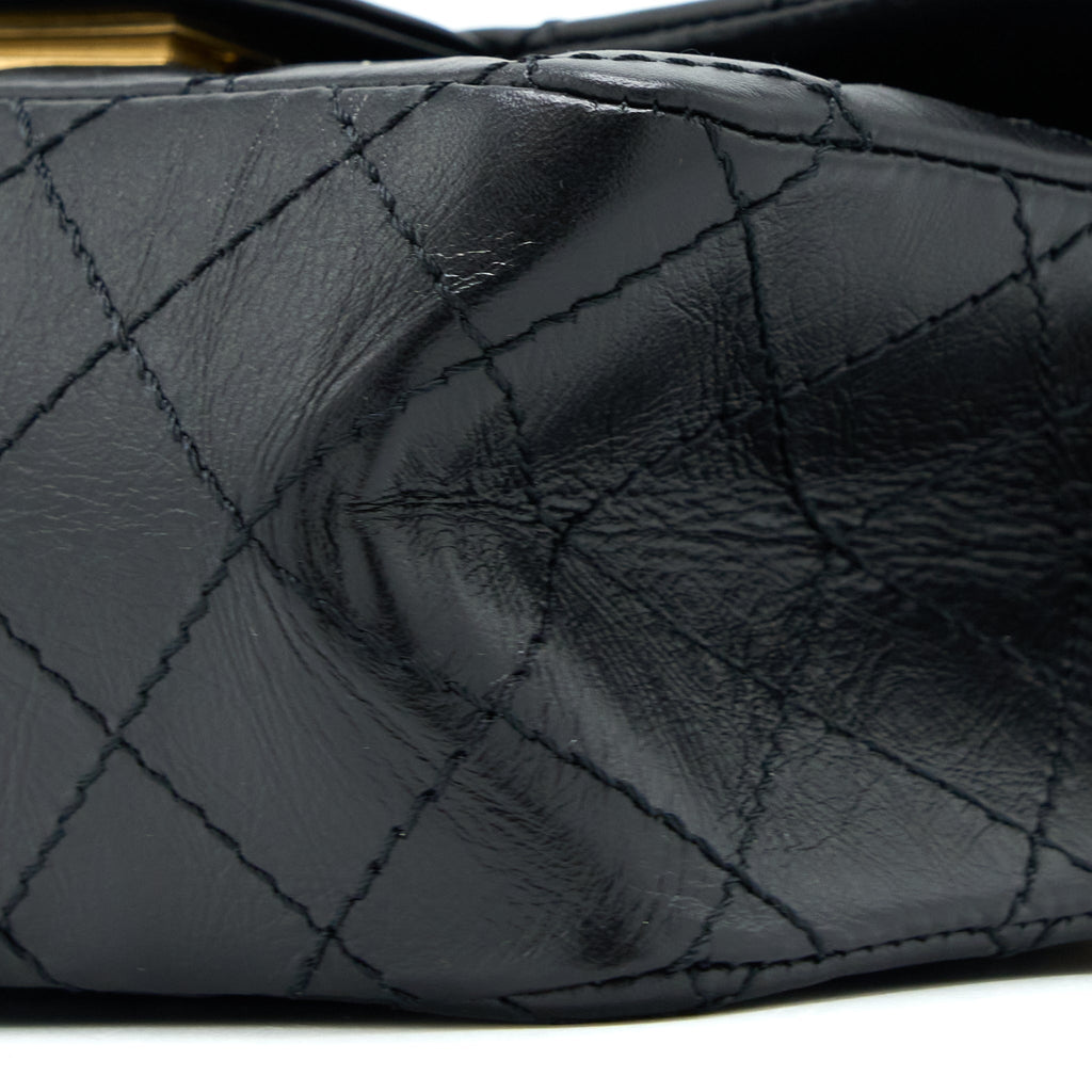 CHANEL MINI 2.55 REISSUE FLAP BAG AGED CALFSKIN BLACK BRUSHED GHW (MICROCHIP)
