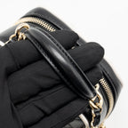 Chanel mini backpack/crossbody bag lambskin black/white LGHW (microchip)