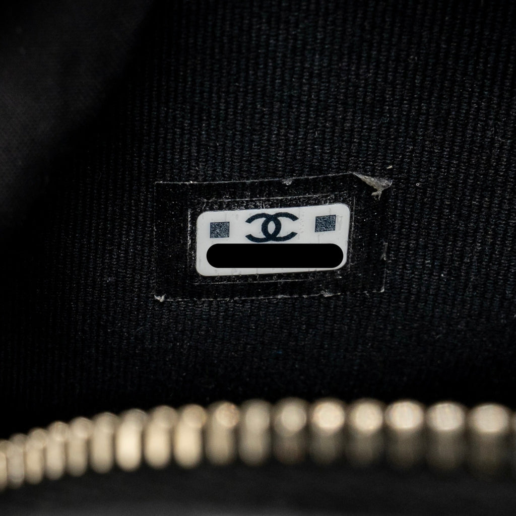 Chanel mini backpack/crossbody bag lambskin black/white LGHW (microchip)