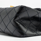 CHANEL MINI 2.55 REISSUE FLAP BAG AGED CALFSKIN BLACK GHW