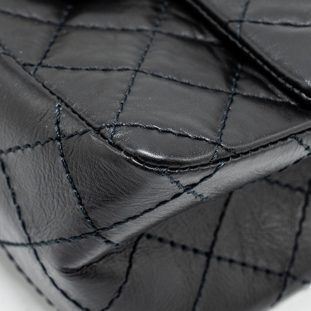 CHANEL MINI 2.55 REISSUE FLAP BAG AGED CALFSKIN BLACK GHW