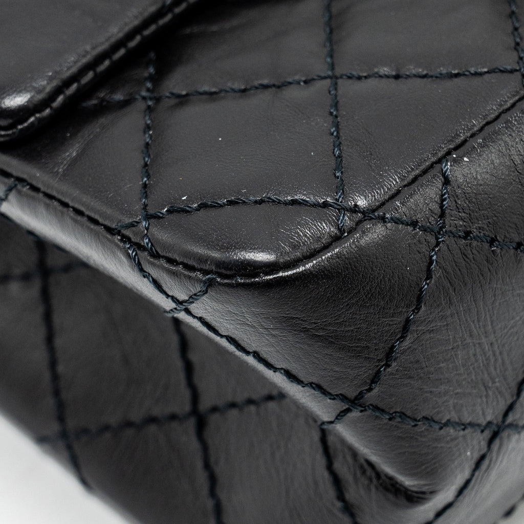 CHANEL MINI 2.55 REISSUE FLAP BAG AGED CALFSKIN BLACK GHW