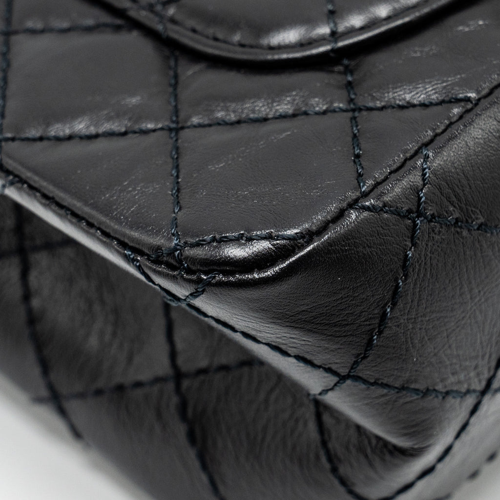 CHANEL MINI 2.55 REISSUE FLAP BAG AGED CALFSKIN BLACK GHW