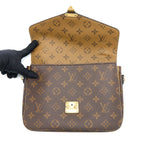 LOUIS VUITTON POCHETTE MÉTIS MONOGRAM REVERSE CANVAS GHW
