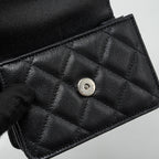 CHANEL 22S COCO LETTERING MINI FLAP BAG WITH ENAMEL TOP HANDLE CAVIAR BLACK SHW