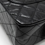 CHANEL MAXI 2.55 REISSUE FLAP BAG AGED CALFSKIN BLACK GHW