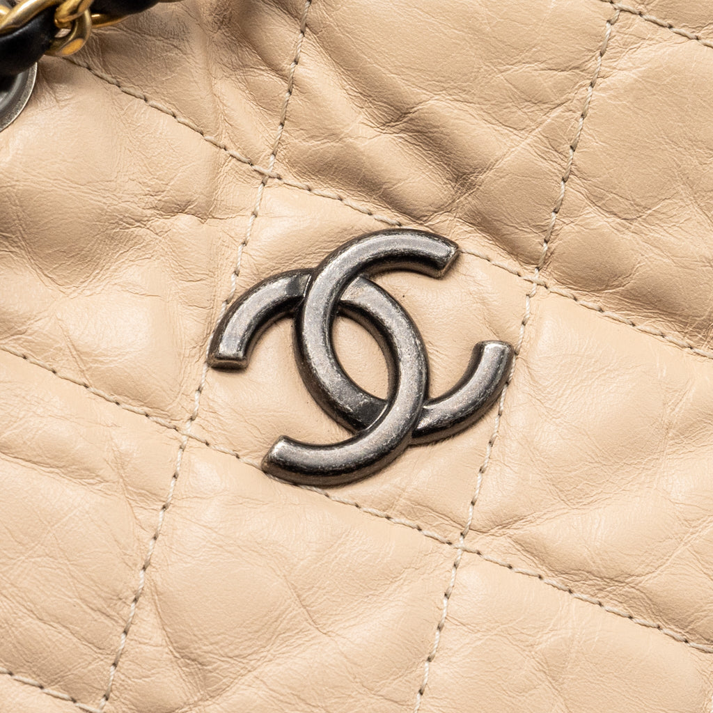 CHANEL MEDIUM GABRIELLE BACKPACK AGED CALFSKIN BEIGE/BLACK MULTICOLOUR HARDWARE