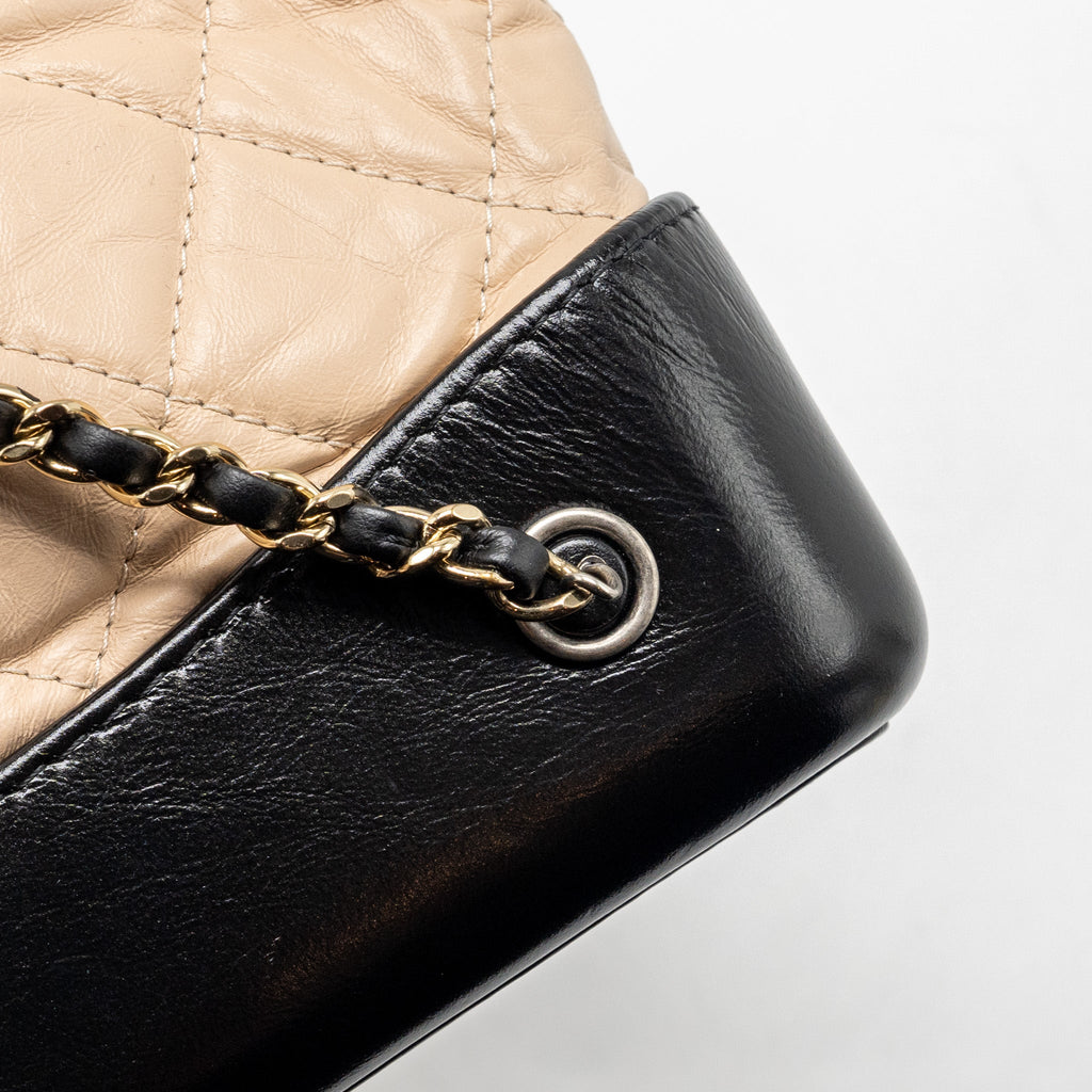 CHANEL MEDIUM GABRIELLE BACKPACK AGED CALFSKIN BEIGE/BLACK MULTICOLOUR HARDWARE
