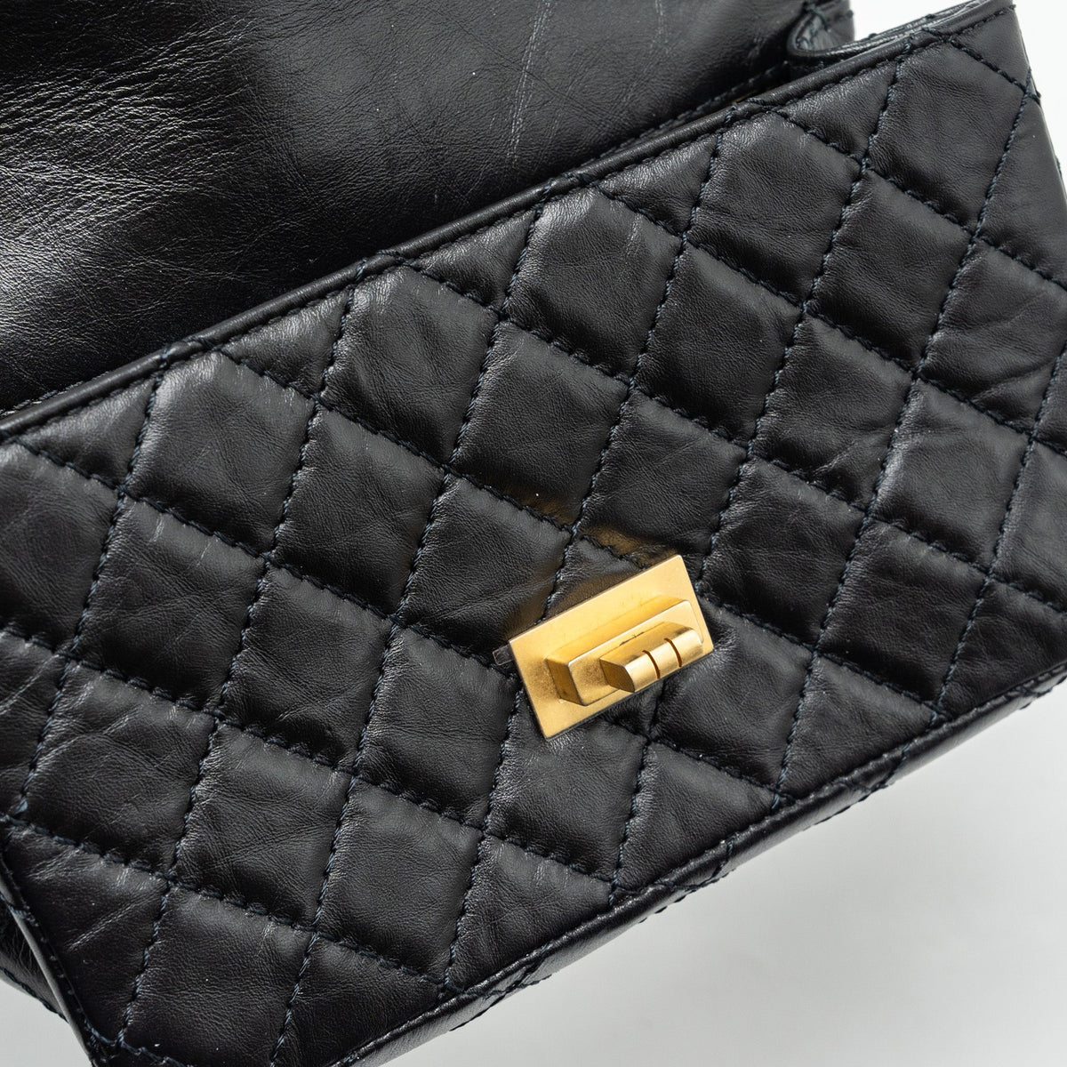 CHANEL MINI 2.55 REISSUE FLAP BAG AGED CALFSKIN BLACK GHW