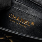 CHANEL MINI 2.55 REISSUE FLAP BAG AGED CALFSKIN BLACK GHW