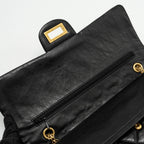 CHANEL MAXI 2.55 REISSUE FLAP BAG AGED CALFSKIN BLACK GHW