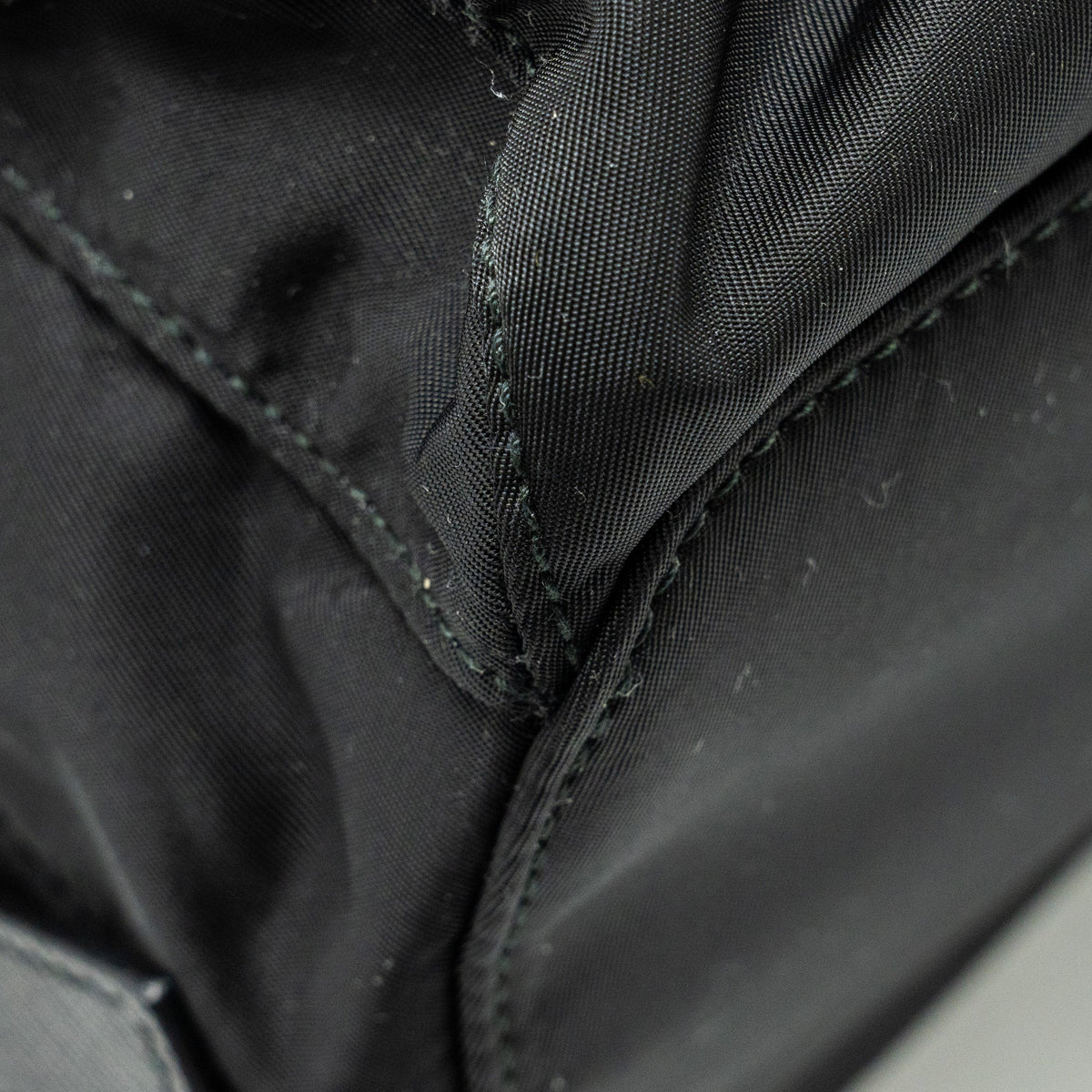 PRADA SMALL RE-NYLON BACKPACK BLACK SHW