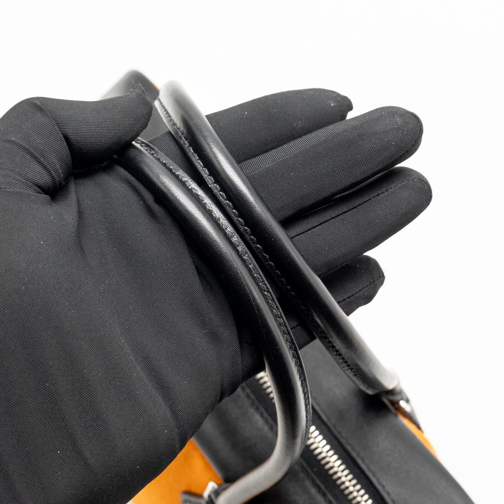 Hermes plume 28 fabric / leather orange / black SHW