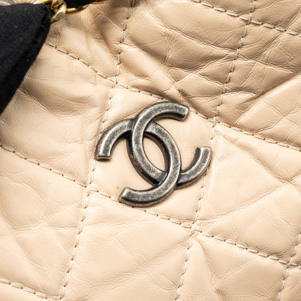 CHANEL SMALL GABRIELLE BACKPACK AGED CALFSKIN BEIGE/BLACK MULTICOLOUR HARDWARE