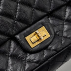 CHANEL SMALL 2.55 REISSUE DOUBLE FLAP BAG AGED CALFSKIN BLACK GHW