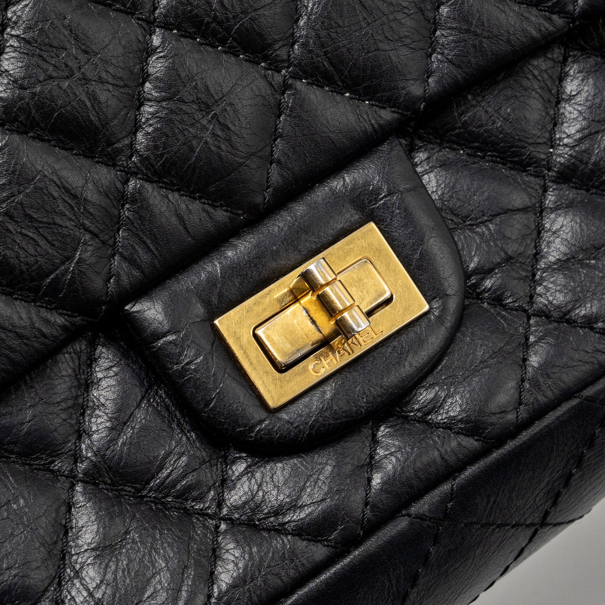CHANEL SMALL 2.55 REISSUE DOUBLE FLAP BAG AGED CALFSKIN BLACK GHW