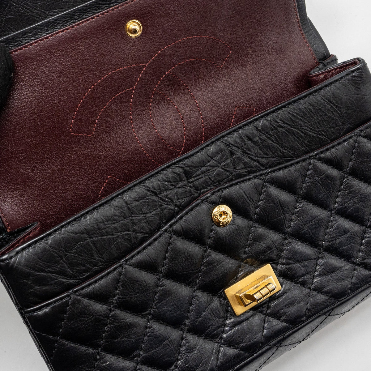 CHANEL SMALL 2.55 REISSUE DOUBLE FLAP BAG AGED CALFSKIN BLACK GHW