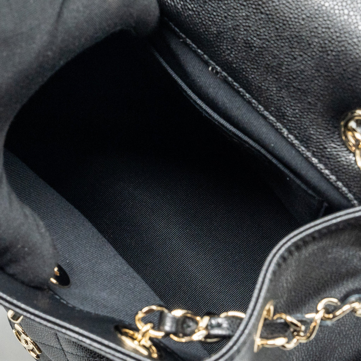 CHANEL TRIPLE POCKET BACKPACK CAVIAR BLACK LGHW (MICROCHIP)