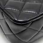 CHANEL 25A ZIP CLUTCH WITH CHAIN CAVIAR BLACK LGHW (MICROCHIP)