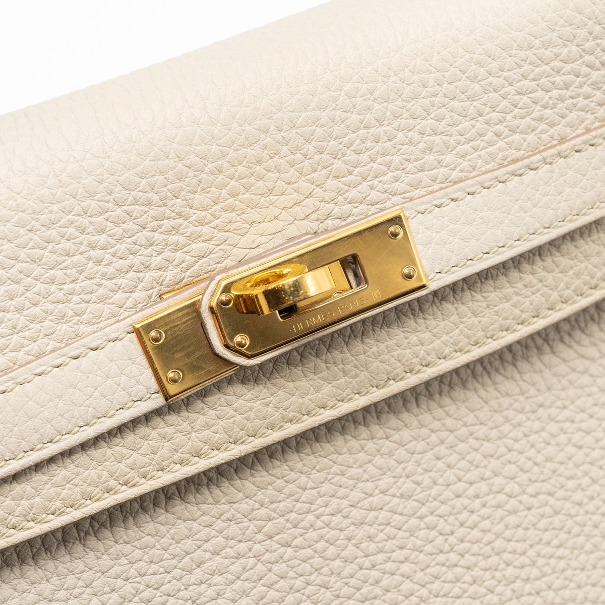 Hermes kelly 25 togo beton GHW with an extra hermes rodeo pm bag charm