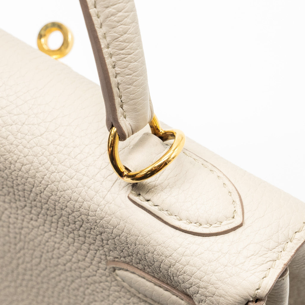 Hermes kelly 25 togo beton GHW with an extra hermes rodeo pm bag charm