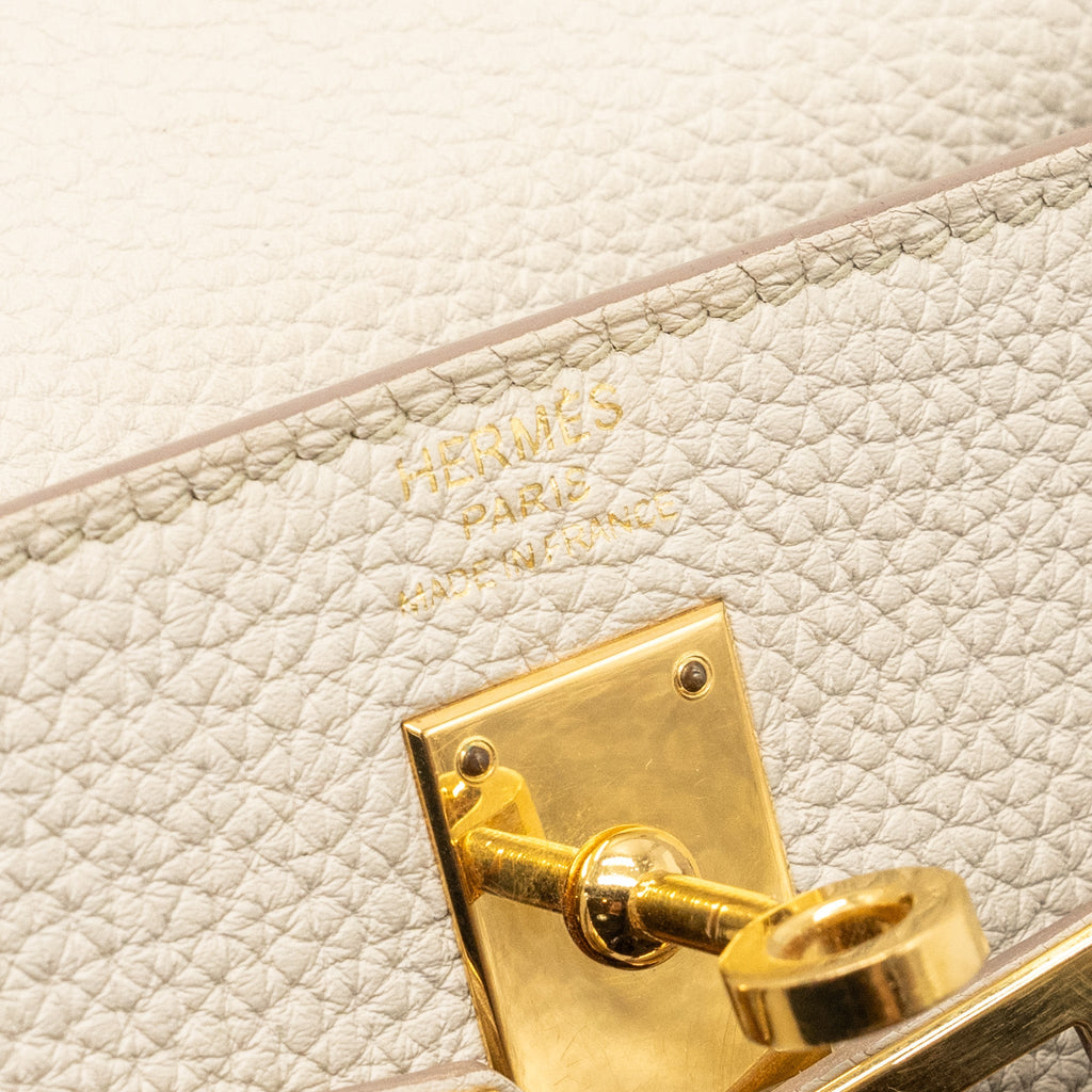 Hermes kelly 25 togo beton GHW with an extra hermes rodeo pm bag charm