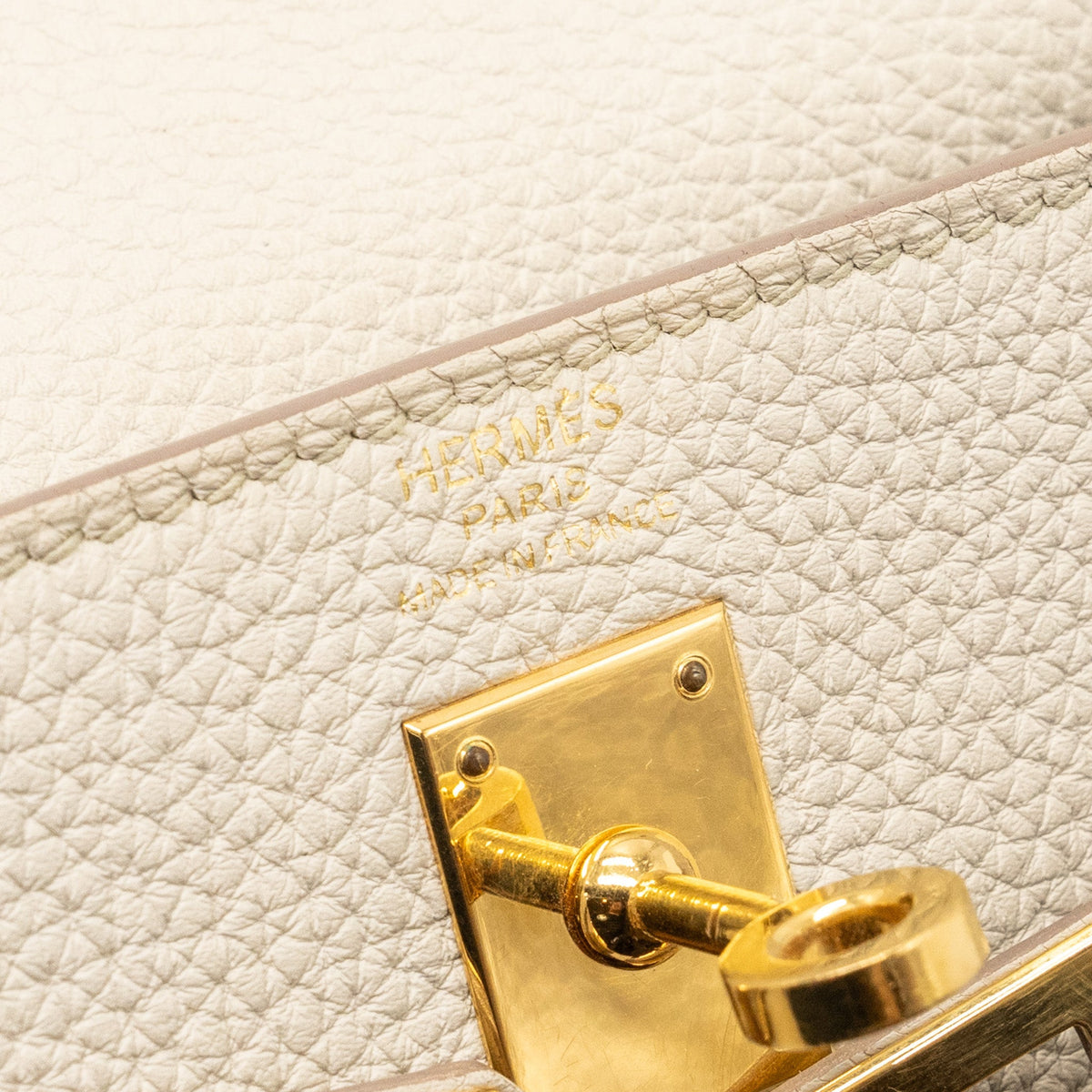Hermes kelly 25 togo beton GHW with an extra hermes rodeo pm bag charm