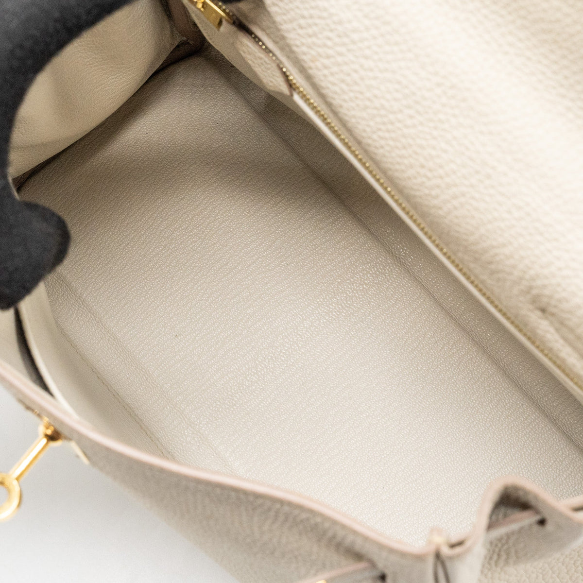 Hermes kelly 25 togo beton GHW with an extra hermes rodeo pm bag charm