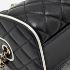 Chanel 25P Quilted Bowling Bag Lambskin Black/White LGHW (Microchip)