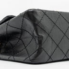 CHANEL MINI 2.55 REISSUE FLAP BAG AGED CALFSKIN BLACK GHW