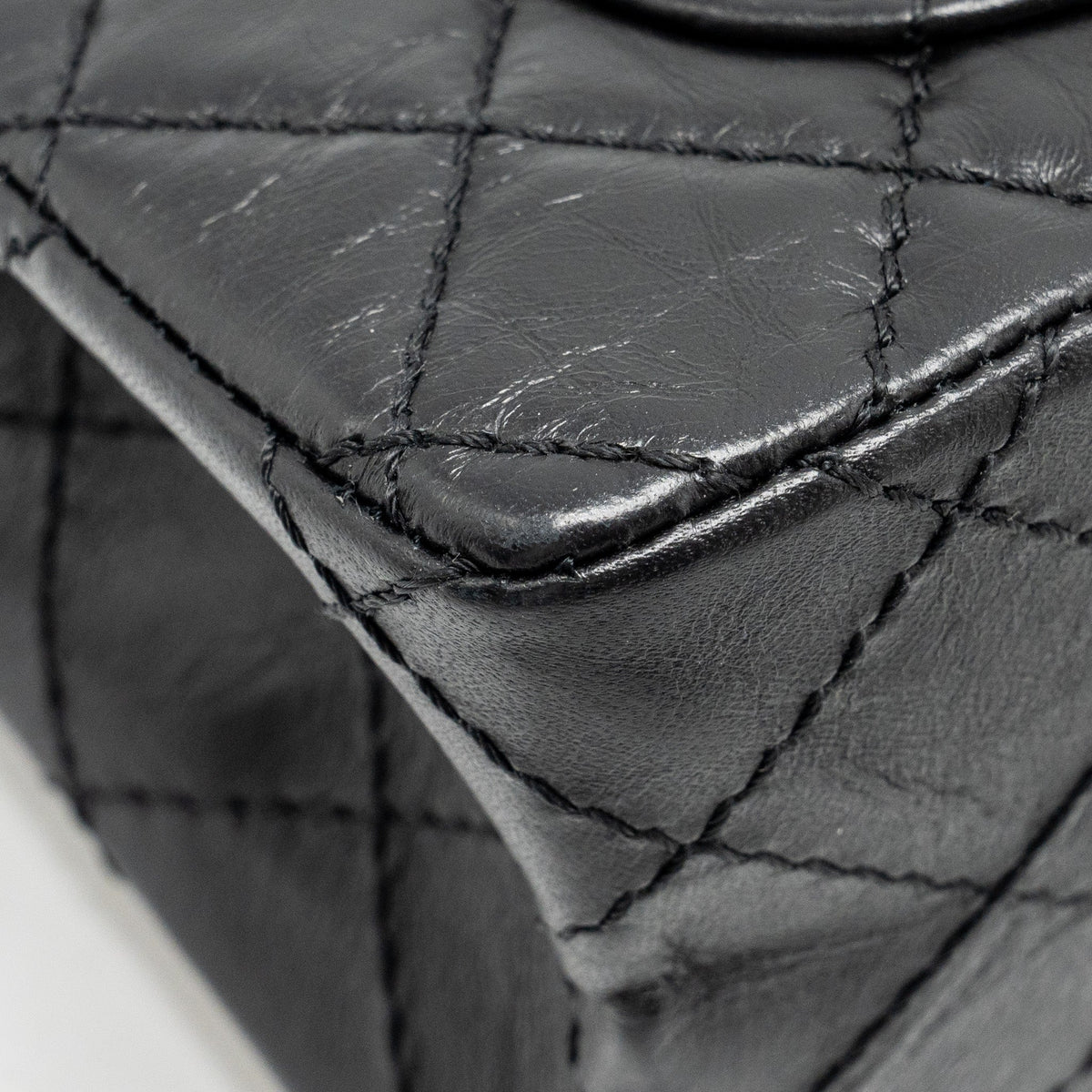CHANEL MINI 2.55 REISSUE FLAP BAG AGED CALFSKIN BLACK GHW