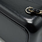 CHANEL GABRIELLE BACKPACK MEDIUM QUILTED CALFSKIN BLACK GOLD/SLIVER HW