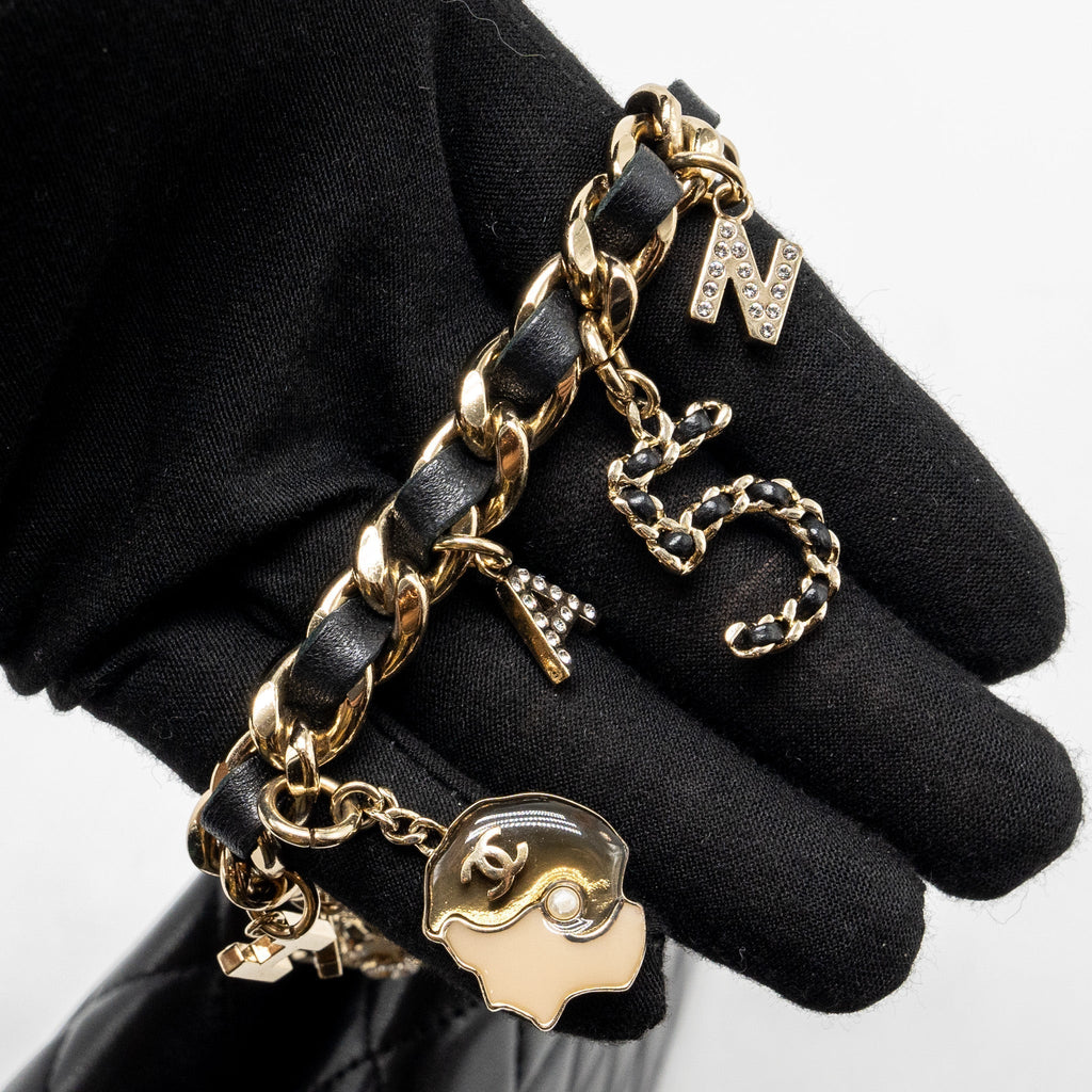 CHANEL COCO CHARMS QUILTED POUCH BAG LAMBSKIN BLACK GHW