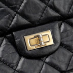 CHANEL LARGE 2.55 REISSUE FLAP BAG AGED CALFSKIN BLACK LGHW