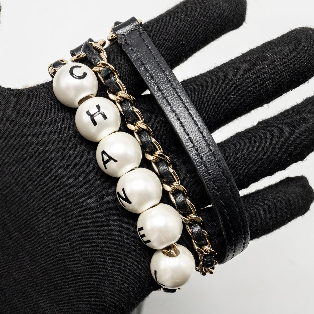 Chanel letter pearl chain mini flap clutch Lambskin black LGHW