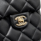 Chanel letter pearl chain mini flap clutch Lambskin black LGHW