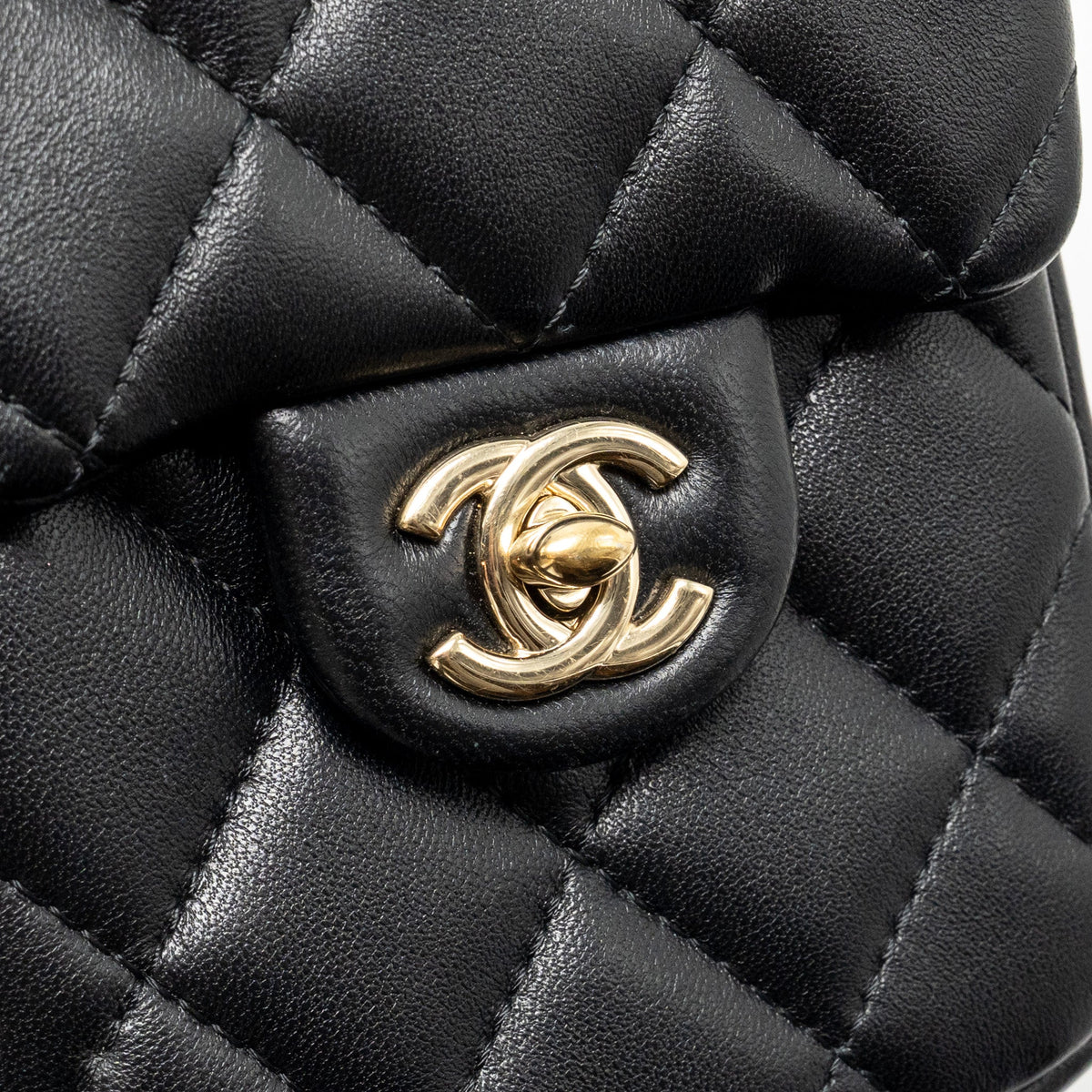 Chanel letter pearl chain mini flap clutch Lambskin black LGHW