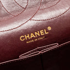 CHANEL MAXI 2.55 REISSUE DOUBLE FLAP BAG AGED CALFSKIN BLACK GHW