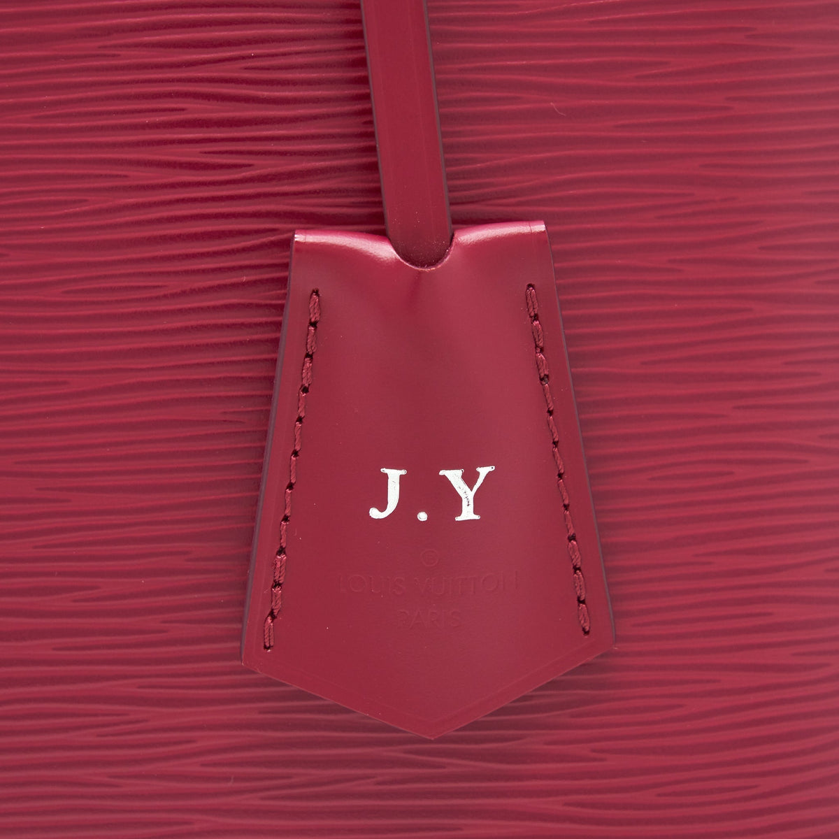 LOUIS VUITTON ALMA PM EPI DARK RED SHW WITH INITIAL J.Y ON KEY TAG
