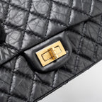 CHANEL MINI 2.55 REISSUE FLAP BAG AGED CALFSKIN BLACK GHW
