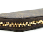 LOUIS VUITTON CLEMENCE LONG WALLET MONOGRAM CANVAS FUCHSIA