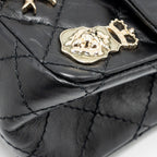 CHANEL MINI 2.55 REISSUE FLAP BAG LUCKY CHARMS AGED CALFSKIN BLACK GHW