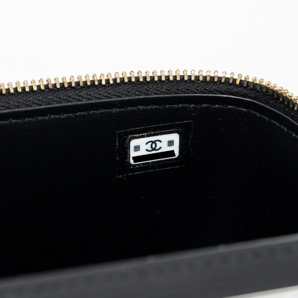 CHANEL LONG VANITY CASE WITH CHARMS CHAIN CALFSKIN BLACK LGHW (MICROCHIP)
