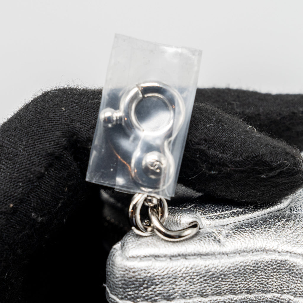 CHANEL STAR COIN PURSE/CHARM QUILTED LEATHER METALLIC SILVER SHW (MICROCHIP)