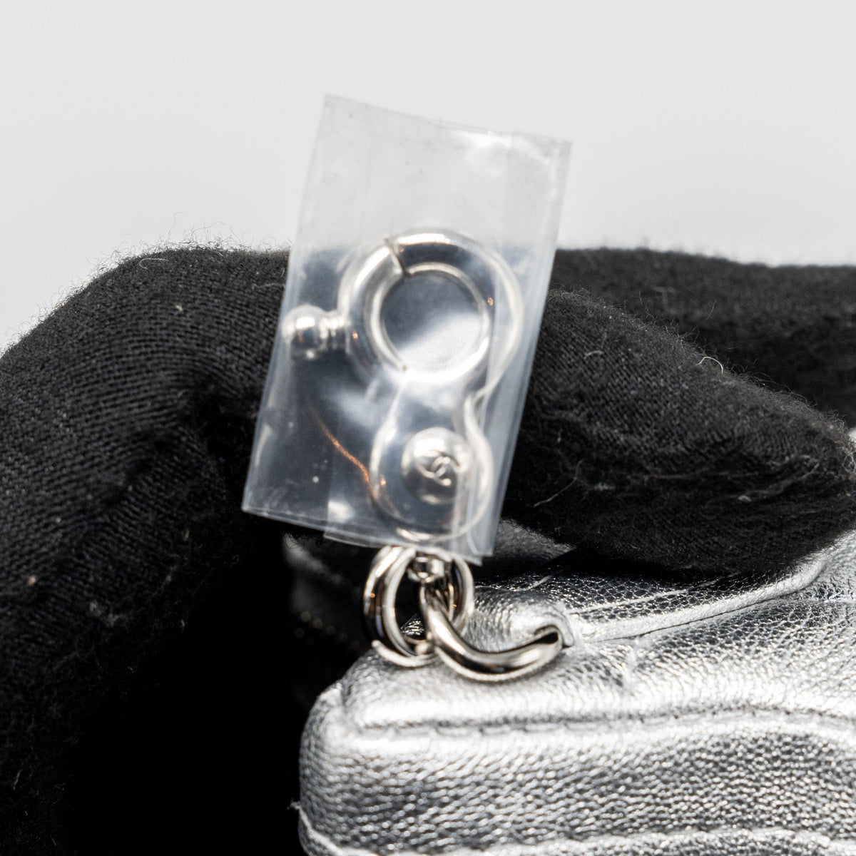 CHANEL STAR COIN PURSE/CHARM QUILTED LEATHER METALLIC SILVER SHW (MICROCHIP)