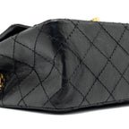 CHANEL MINI 2.55 REISSUE FLAP BAG AGED CALFSKIN BLACK GHW